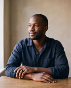 Man in a dark navy linen shirt wearing the black Atlas Dome Band