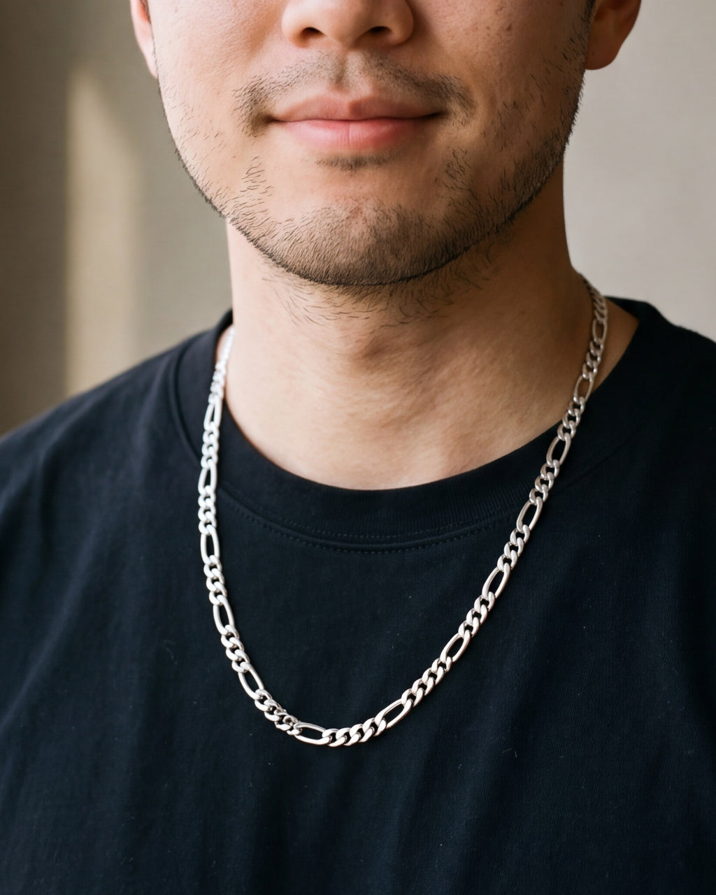 Close-up of the silver-tone Atlas figaro chain worn at true size