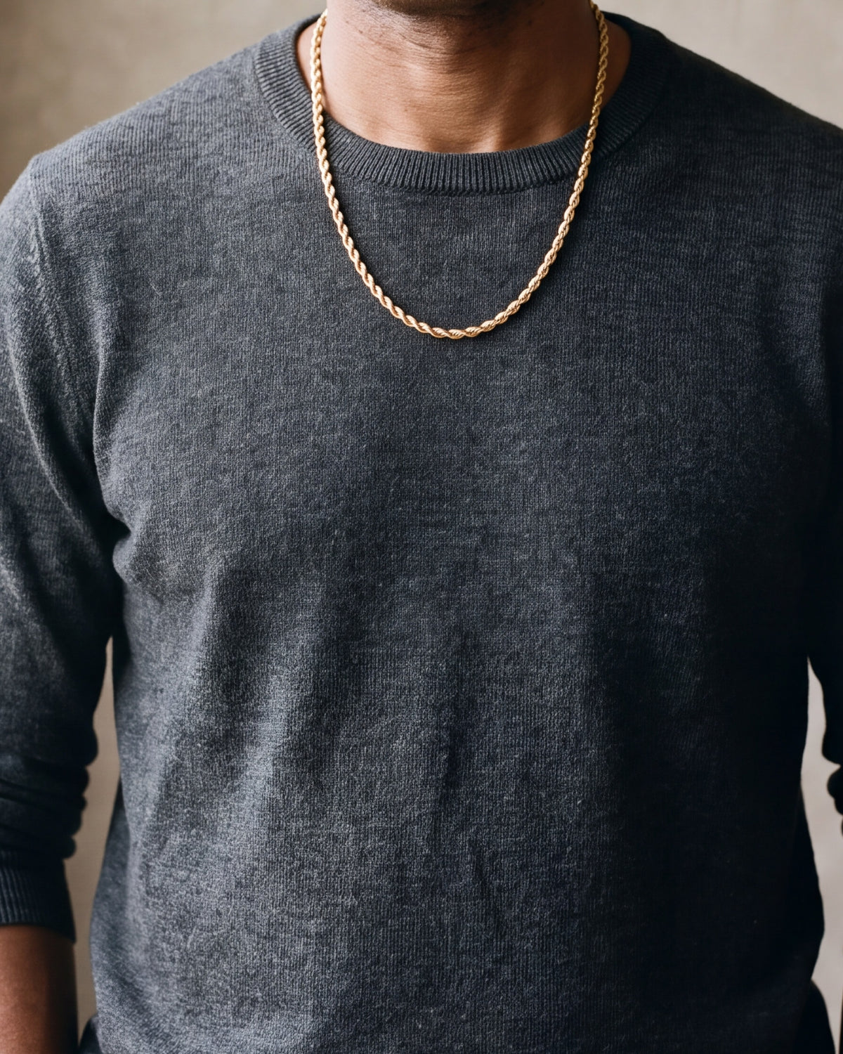 Close-up of the gold-tone Atlas gold-tone rope chain worn at true size