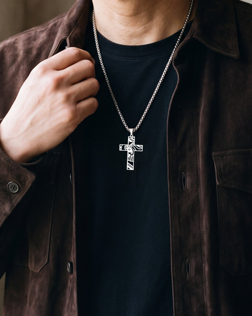 Close-up of the silver-tone Atlas hollow cut-out cross pendant necklace worn, true size