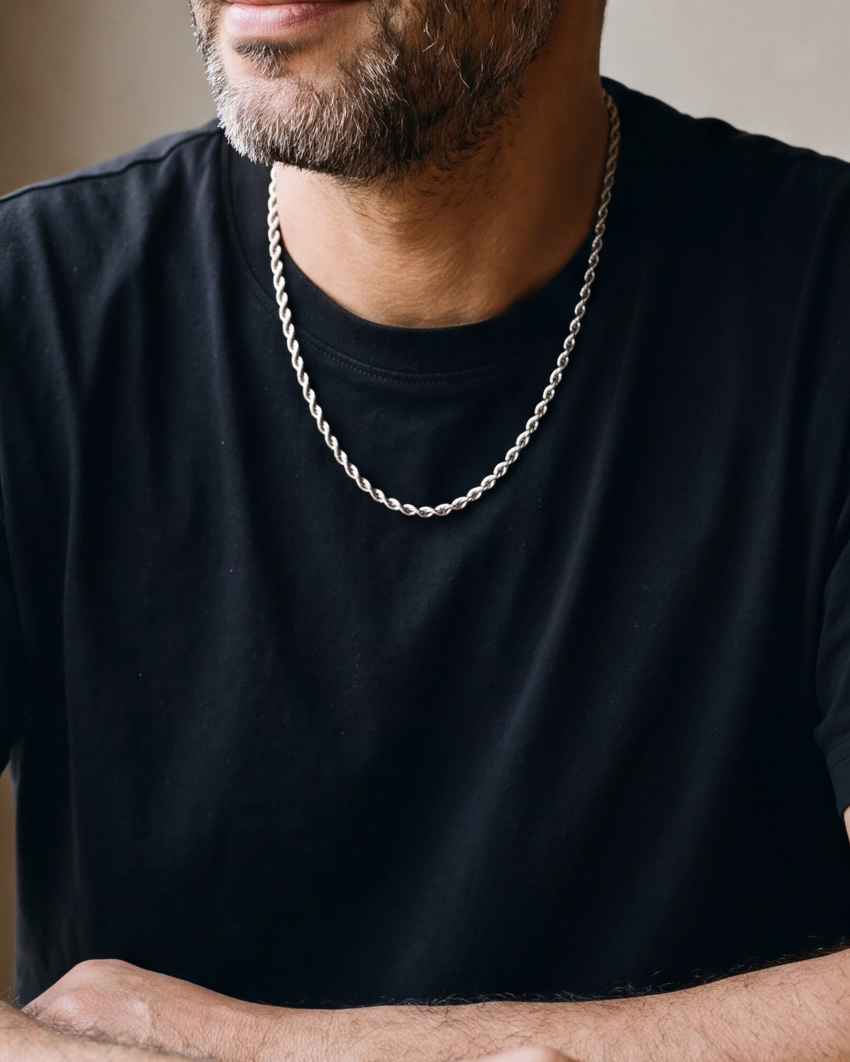 Close-up of the 4 mm Atlas rope chain on a man's neck at true size