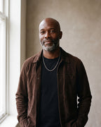 Man in a brown suede overshirt wearing the 3 mm silver-tone Atlas rounded box chain