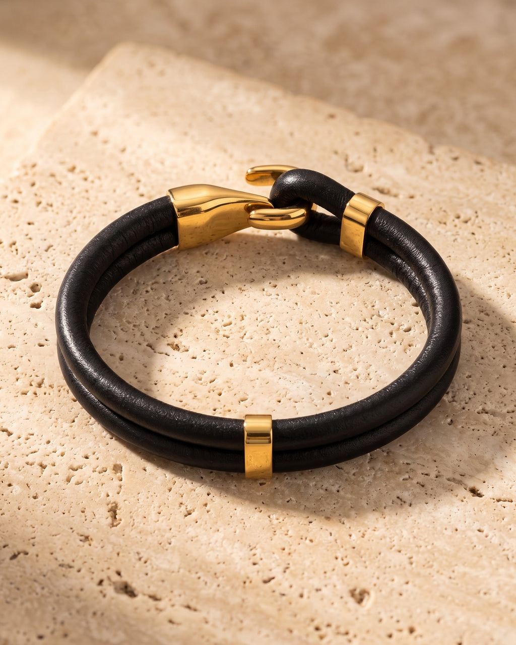 The smooth leather Atlas two-strand hook bracelet with gold-tone hook on warm stone [c:smoothgoldtone]