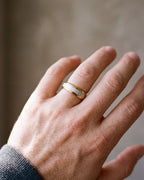 Close-up of the plain Atlas two-tone frosted band worn at true size