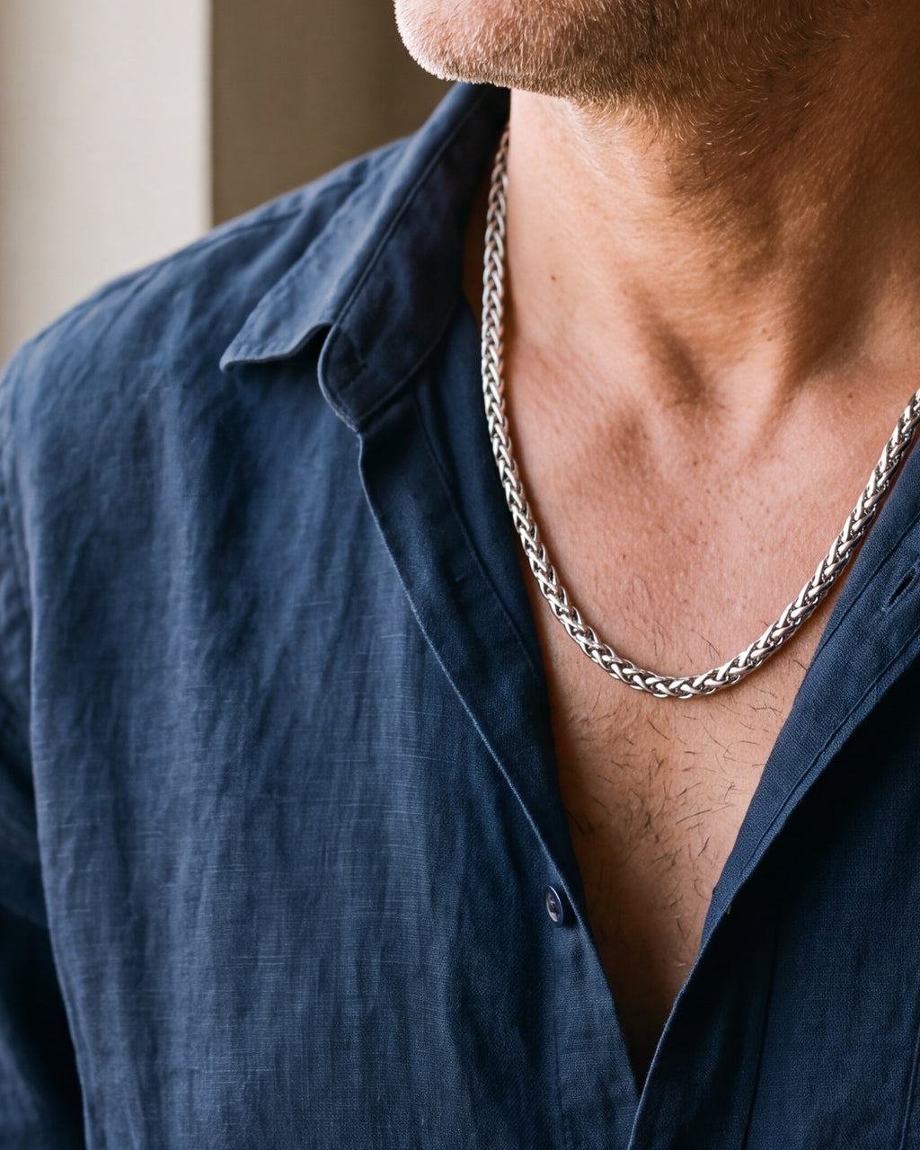 Close-up of the 5 mm silver Atlas wheat chain worn at true size