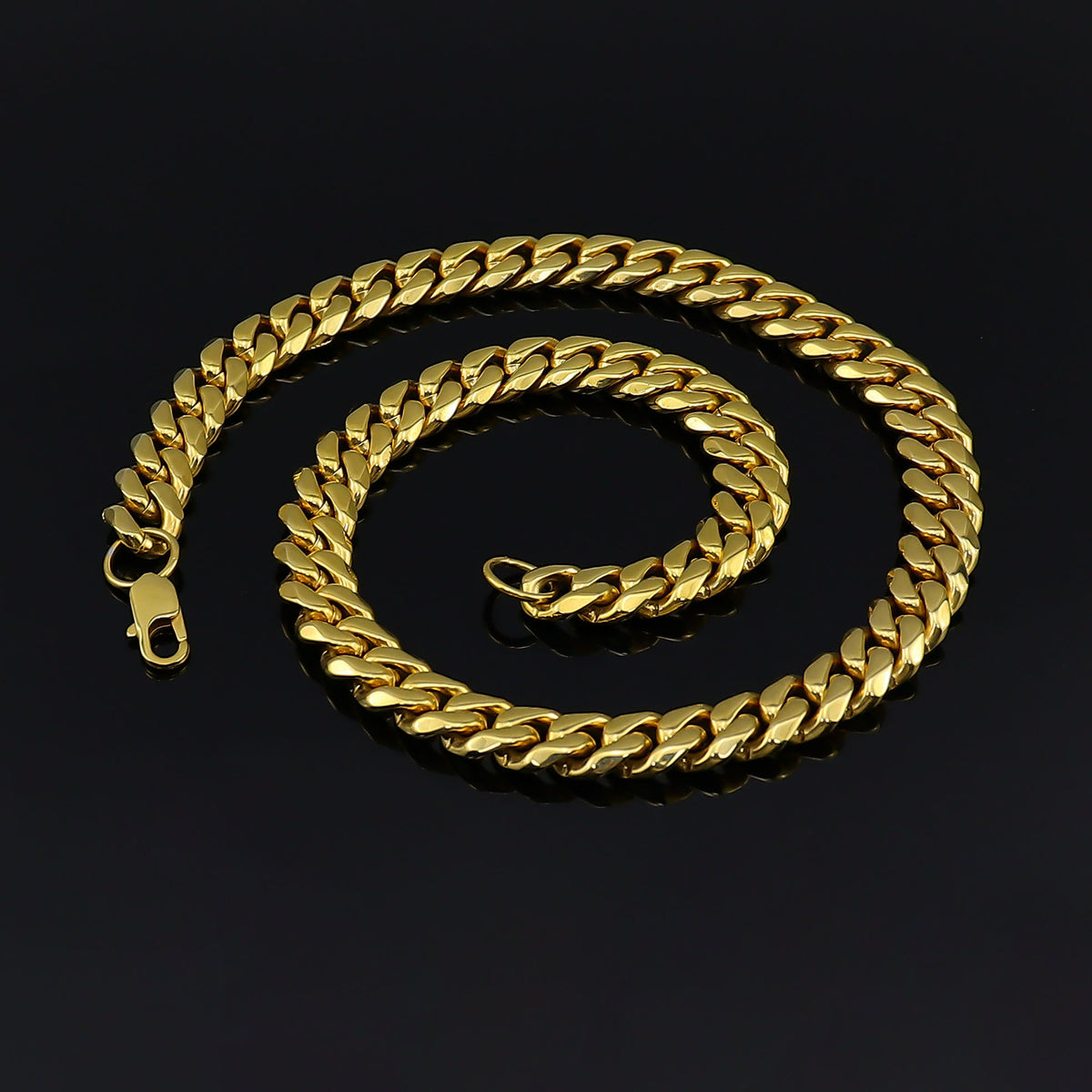 Cuban Link Chain Necklace, gold-tone finish, coiled
