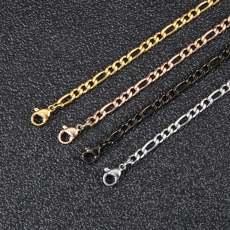 The Flat Gold-Tone Figaro Chain in Stainless Steel, view 3