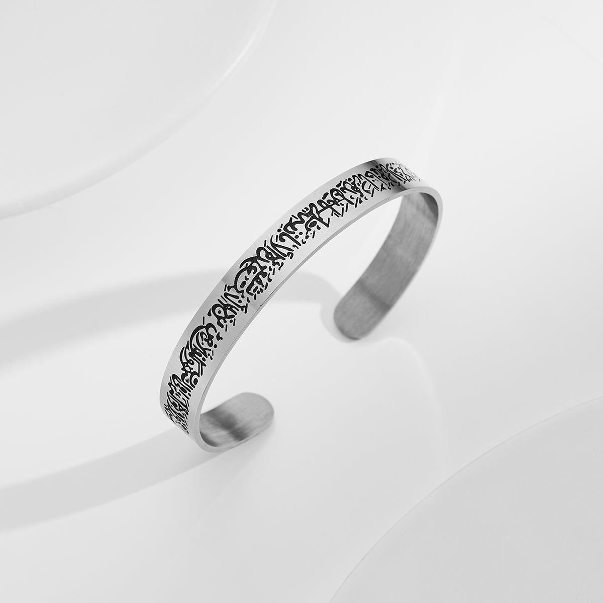 10mm Script Engraved Stainless Steel Cuff with black Arabic script engraving on a brushed silver finish