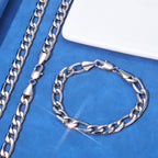 5mm Figaro Link Stainless Steel Chain in silver color with a bracelet