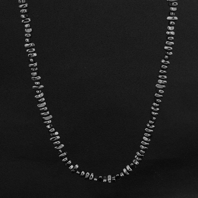 5mm Irregular Bead Stainless Steel Chain, silver finish, black background view 3