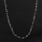 5mm Irregular Bead Stainless Steel Chain, silver finish, black background view 3