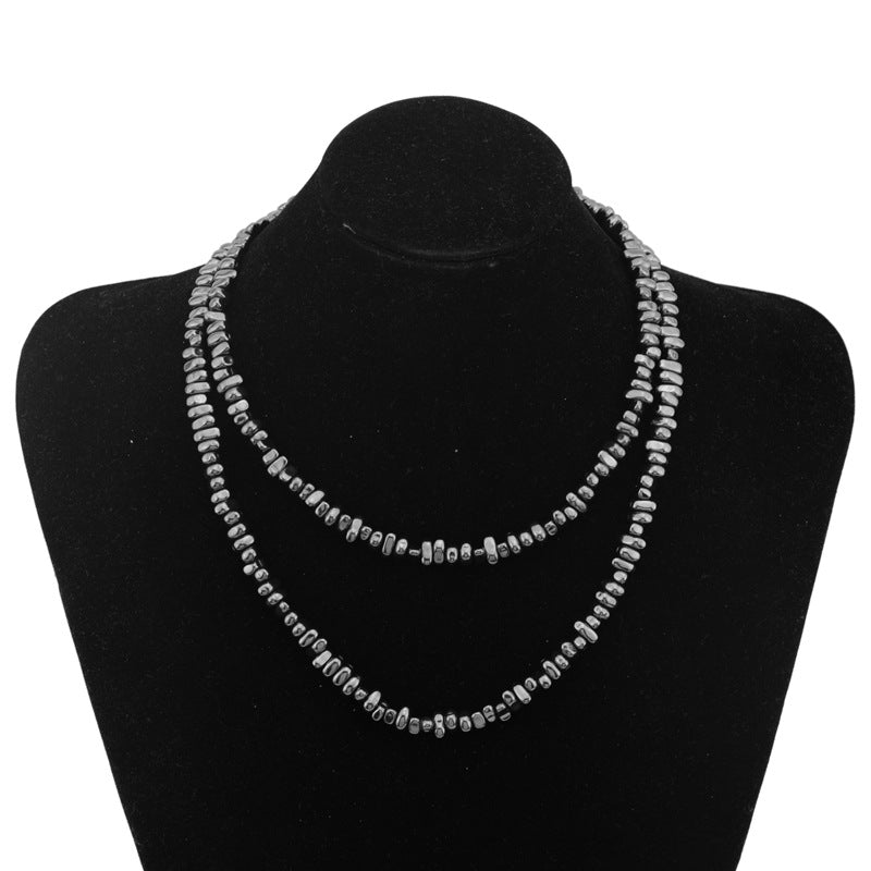 5mm Irregular Bead Stainless Steel Chain, silver finish, black background view 5