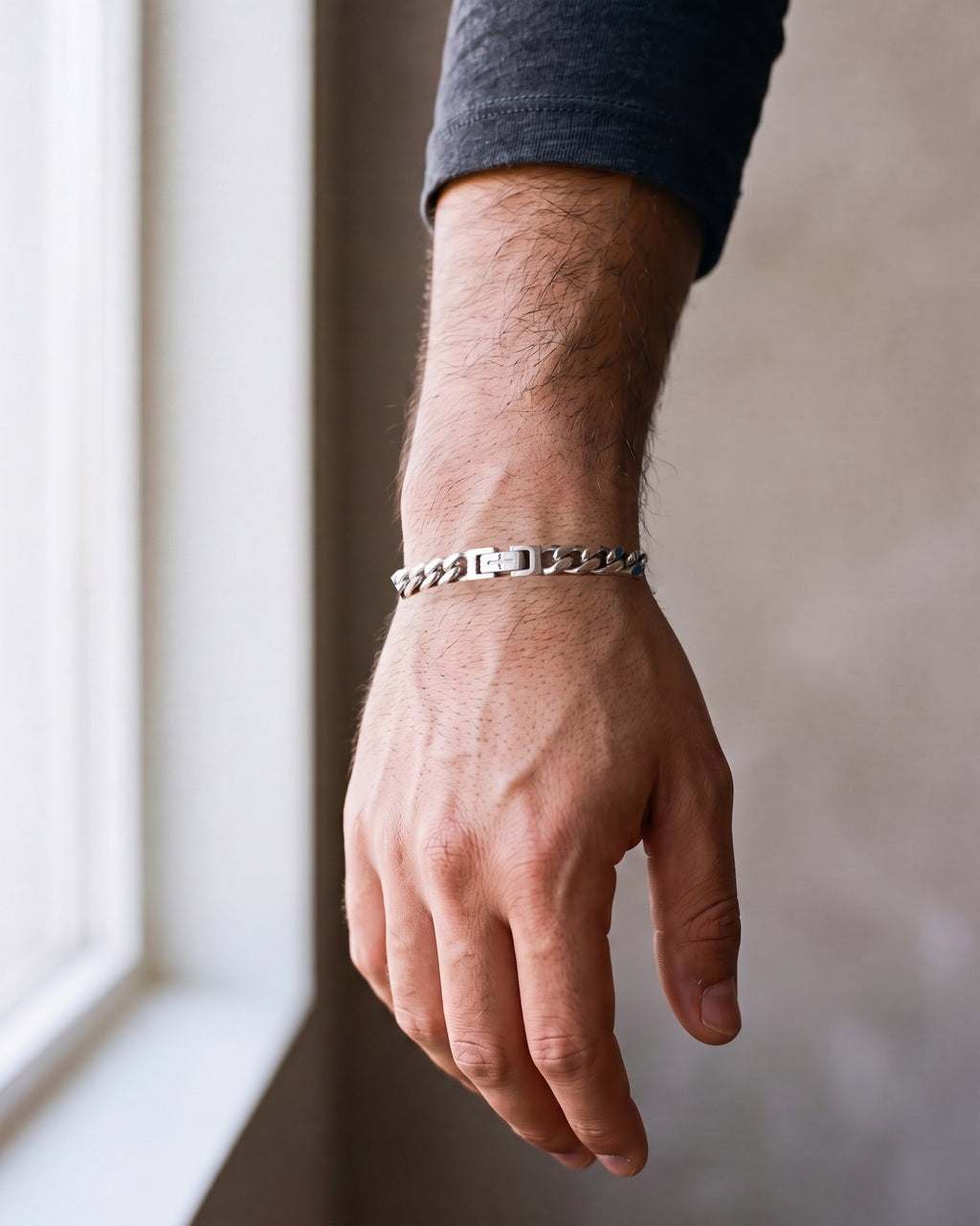 Close-up of the silver-tone Atlas Miami Cuban Bracelet worn, true size