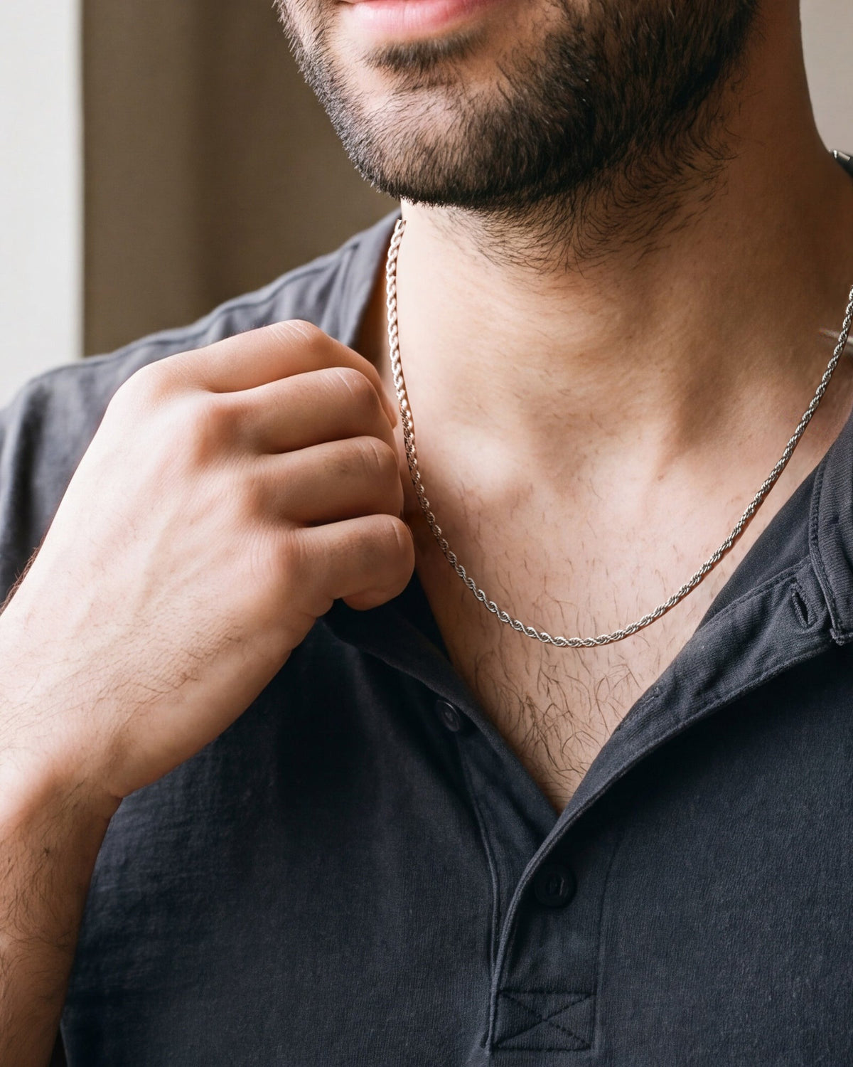 Close-up of the silver Atlas Twisted Rope Chain worn, true size